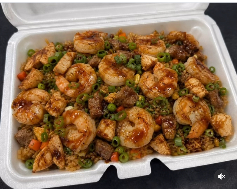 Surf and turf fried rice with shrimp, chicken and steak